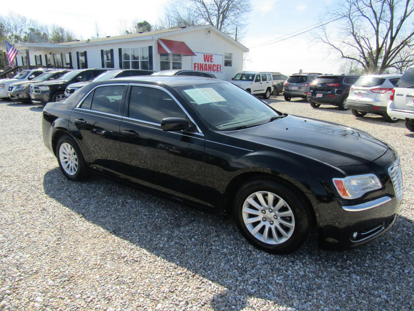 2013 Black /Tan Chrysler 300 RWD (2C3CCAAG5DH) with an 3.6L V6 SOHC 24V engine, Automatic transmission, located at 15016 S Hwy 231, Midland City, AL, 36350, (334) 983-3001, 31.306210, -85.495277 - Photo#0